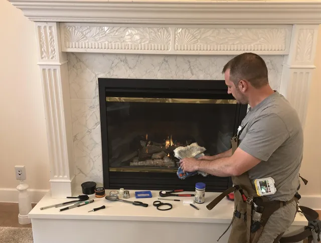 Pooler Chimney Sweep performing fireplace maintenance in Pooler, GA
